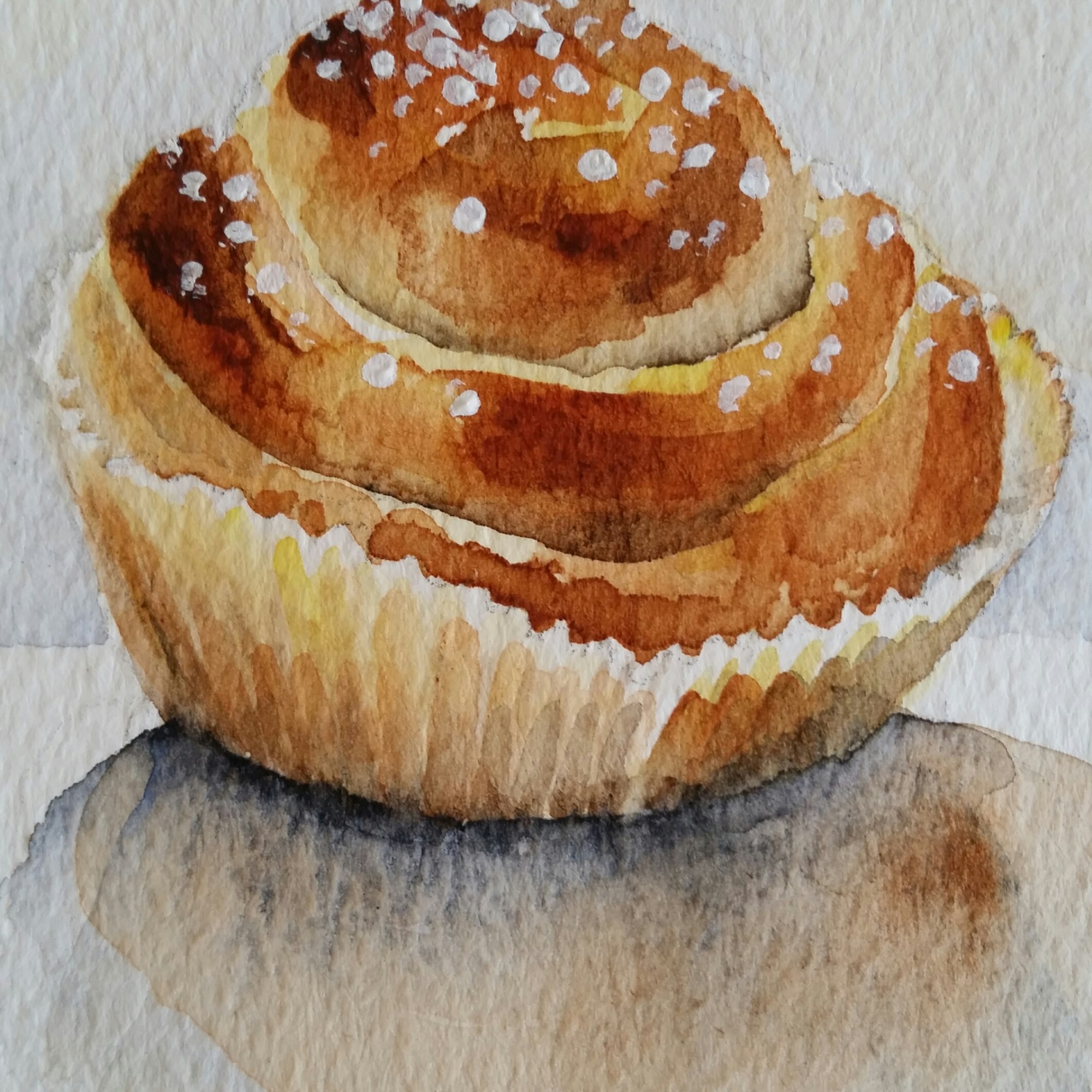 Akvarellmålning föreställande kanelbulle